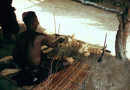 Man Weaving Raffia Mat in Kasai Province