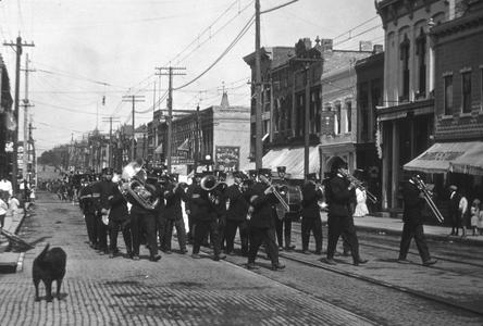 Brass band marches down the street