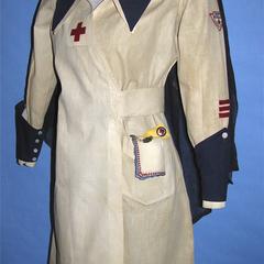Red Cross uniform with I.D. bracelet and pin