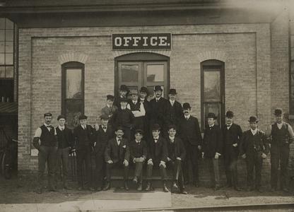 Chicago Brass Company employees outside the main office
