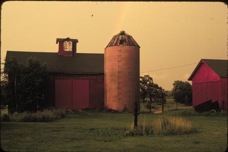 Barn house located behind UW-Wakesha with a rainbow in the sky