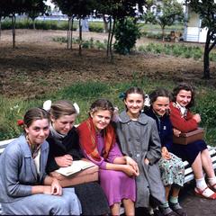 Schoolgirls on a bench