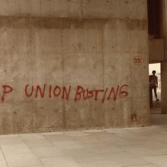 "Stop union busting" graffiti on Mosse Humanities building