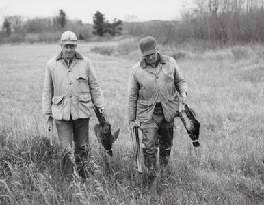 Russell Mattison and Stanley DeBoer pheasant hunting