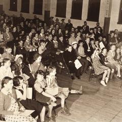 Assembly at a party in Monroe, Wisconsin, for children with physical disabilities