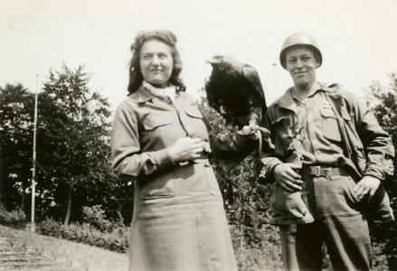 Ray standing next to a falconer
