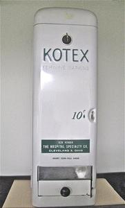 White Kotex sanitary napkins dispenser
