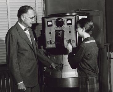President Fryklund inspects the Fade-ometer