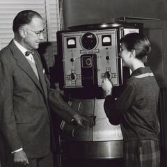 President Fryklund inspects the Fade-ometer