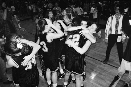 Women basketball players celebrating