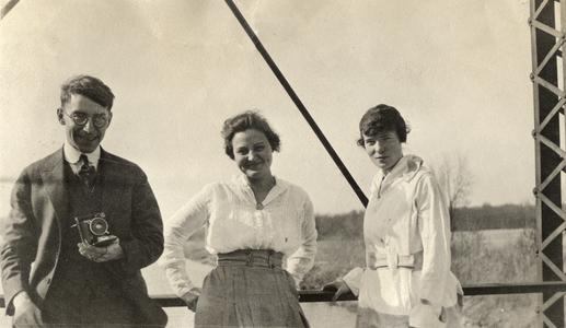 William J. Meuer and friends on a bridge