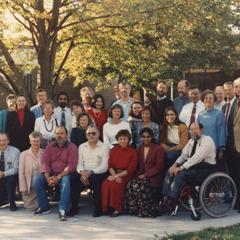 Faculty group shot in courtyard