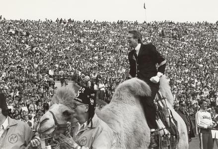 Michael Leckrone riding a camel