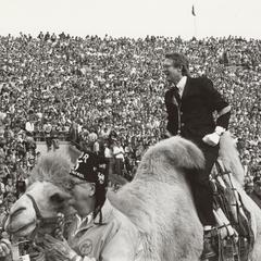 Michael Leckrone riding a camel