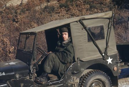 Cyril Burns in a jeep