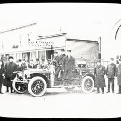 Kenosha's first motor fire truck with Chief Henry Isermann and officials