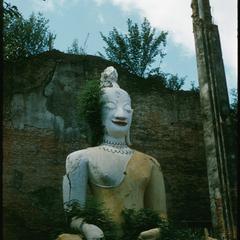Large Buddha image, cracks on torso