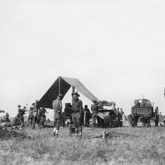 Soldiers of the US Army's 15th Infantry Regiment setting up tents.
