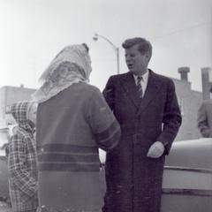 John F. Kennedy shaking hands
