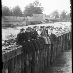 Kemper Hall Class of 1896 on pier looking down
