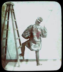 [Man with ladder]