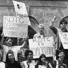 Protesters with ROTC discrimination signs