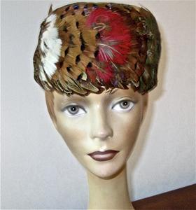 Pillbox hat with pheasant feathers