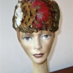 Pillbox hat with pheasant feathers