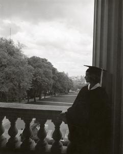 Graduate looking out at Bascom Hill
