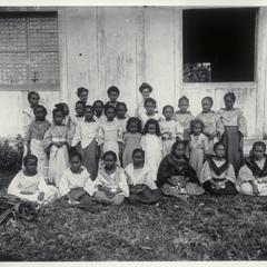 Filipino school girls and teachers, Surigao, 1901