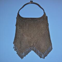 Soldered ring mesh bag with Vandyke fringe