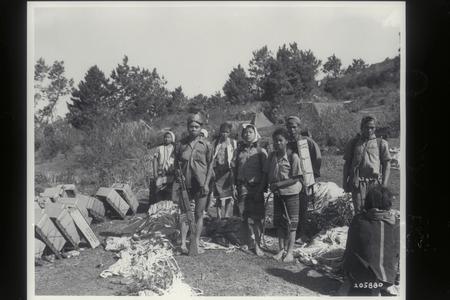Igorot women employed to carry supplies, Northern Luzon, 1945