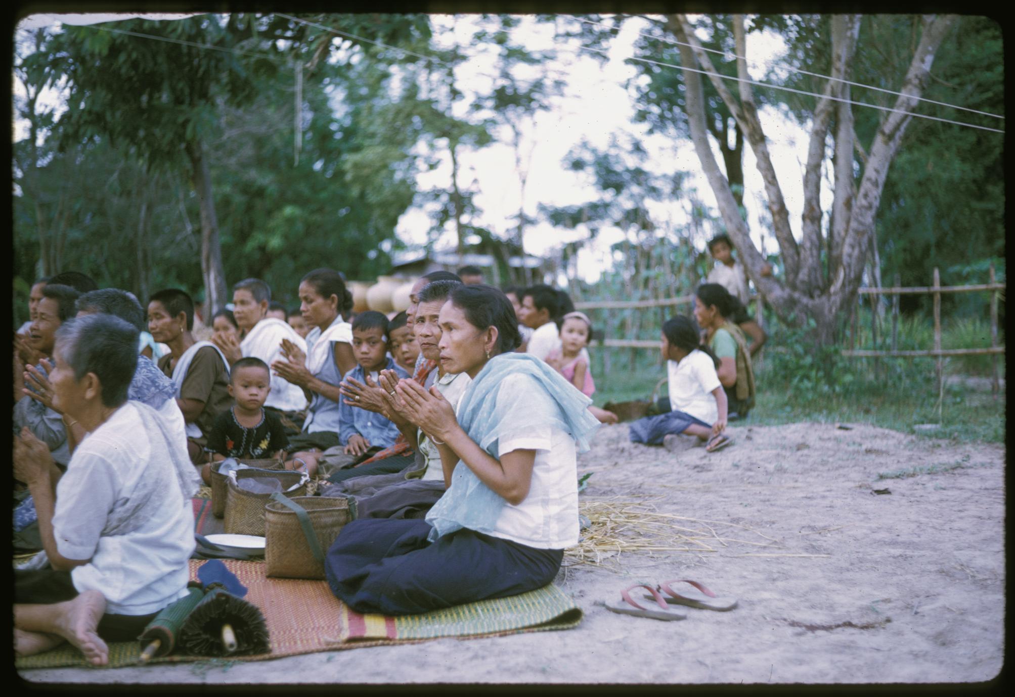 Ban Pha Khao : villagers praying (note : segregation of sexes)