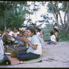 Ban Pha Khao : villagers praying (note : segregation of sexes)