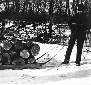 Carl Leopold with sled full of firewood