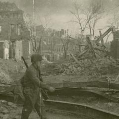 Marching through bombed-out Magdeburg after battle