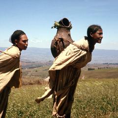 Oromo Women Carrying Loads in Ceramic Vessels