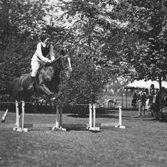 Woman equestrian jump