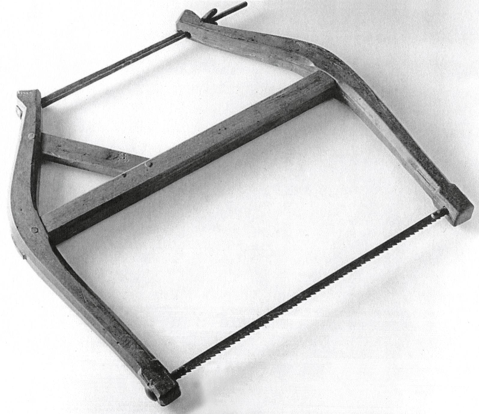 Black and white photograph of a bow or frame saw.