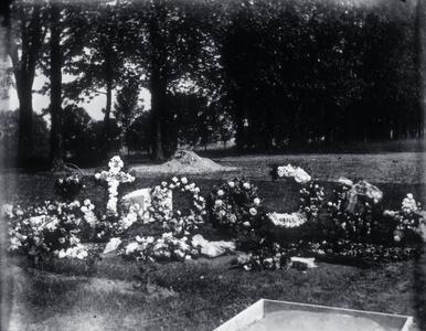 Memorial flowers in cemetery for Krueger family