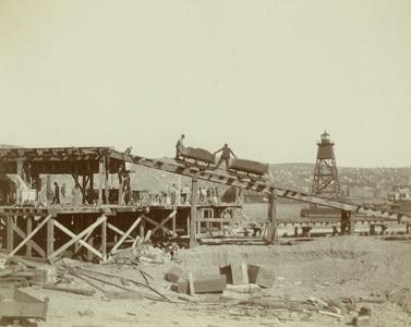 Corps of Engineers workers build the entry piers to the Duluth Ship Canal