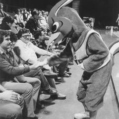 Phoenix mascot with fans at the Brown County Veterans Memorial Arena