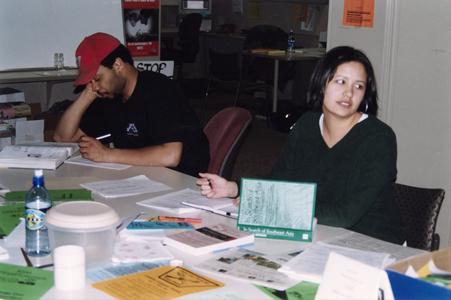 Two students working at a table