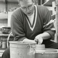 Student at pottery wheel