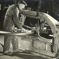 Sid Fewings working in submarine construction program