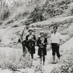 Akha and James Martois and Mr. Teung on banks of Mekong River in Houa Khong Province