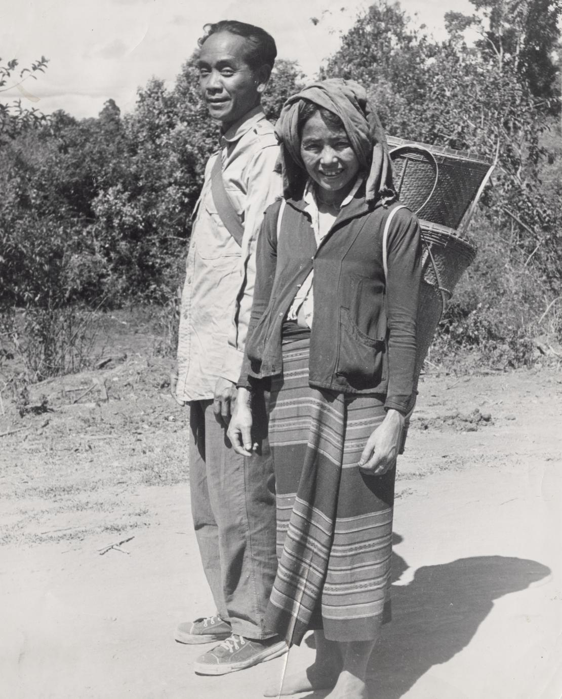 Nyaheun village headman and his wife pose for a photograph in Attapu Province