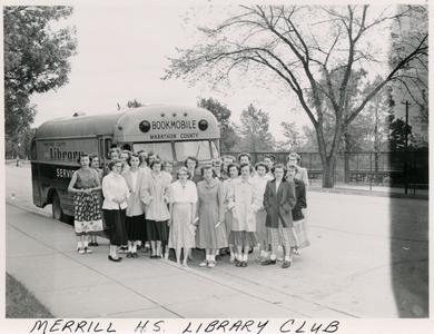 Marathon County Library Service Bookmobile at Merrill High School Library Club.