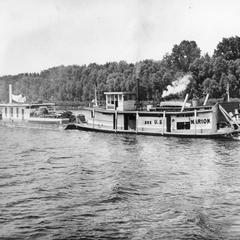 Stern side view of the Marion pushing barge