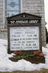Church sign with Sunday German service